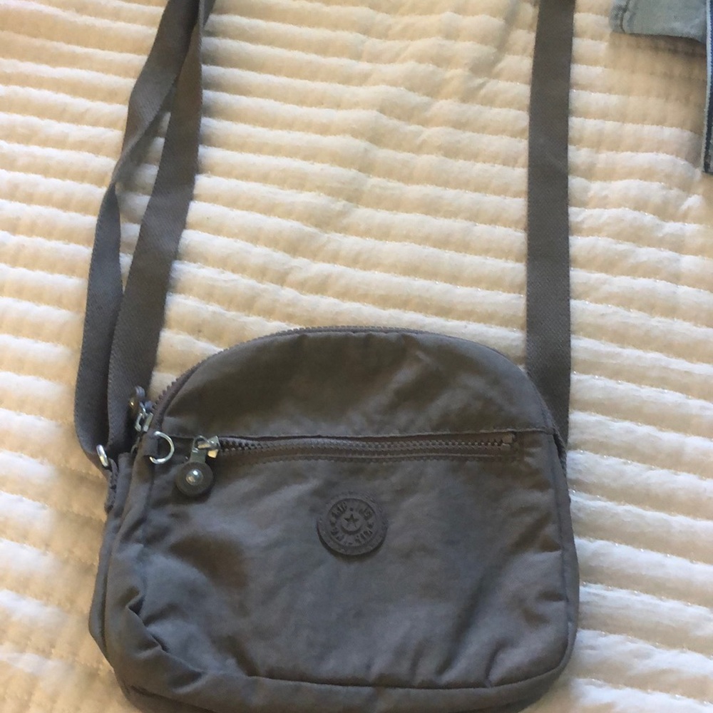 Brown Kipling cross body purse